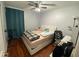 Bright bedroom with wood floors and plenty of space for a queen bed at 2213 Rio Pinar Lakes Blvd, Orlando, FL 32822