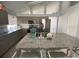 Kitchen with granite countertops and stainless steel appliances at 2213 Rio Pinar Lakes Blvd, Orlando, FL 32822
