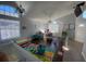 Playroom with hardwood floors, toys, and plenty of natural light at 2213 Rio Pinar Lakes Blvd, Orlando, FL 32822
