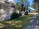 Side of house with landscaping and walkway at 2213 Rio Pinar Lakes Blvd, Orlando, FL 32822