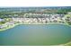 Expansive aerial view of lakefront homes at 249 Treviso Dr, Kissimmee, FL 34759