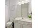Clean and bright bathroom with a shower, vanity, and toilet at 4449 Shiva Loop, Kissimmee, FL 34746