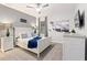 Relaxing bedroom with a king-size bed and calming decor at 4449 Shiva Loop, Kissimmee, FL 34746