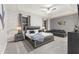 Bright bedroom featuring a king-size bed and ample natural light at 4449 Shiva Loop, Kissimmee, FL 34746