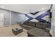 Game room with sectional sofa, ping pong and projector at 4449 Shiva Loop, Kissimmee, FL 34746