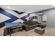 Spacious game room with ping pong, basketball game and sectional at 4449 Shiva Loop, Kissimmee, FL 34746