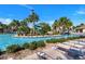 Relaxing pool area with lounge chairs and waterslide at 8932 Cabot Cliffs Dr, Davenport, FL 33896