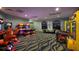 Fun game room with arcade games and air hockey at 8932 Cabot Cliffs Dr, Davenport, FL 33896