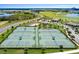 Six well-maintained tennis courts in a community setting at 8932 Cabot Cliffs Dr, Davenport, FL 33896