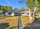 Updated home with a large front yard and walkway at 905 W 11Th Ave, Mount Dora, FL 32757