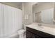 Clean bathroom with single vanity, shower and toilet at 1181 Trappers Trail Loop, Davenport, FL 33896