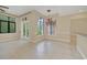 Formal dining room with tile floors and access to the outdoors at 1233 Aquila Loop, Celebration, FL 34747