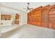 Open floor plan with a view of kitchen and built-in shelving at 1233 Aquila Loop, Celebration, FL 34747