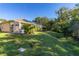 Aerial view showcasing home and surrounding landscape at 1287 Glendora Rd, Kissimmee, FL 34759