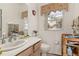 Small bathroom with single sink and toilet at 1287 Glendora Rd, Kissimmee, FL 34759
