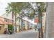 Picturesque community street with palm trees and inviting storefronts at 1287 Glendora Rd, Kissimmee, FL 34759