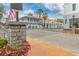 Charming street with flower pots and Spanish-style buildings at 1287 Glendora Rd, Kissimmee, FL 34759