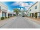 Brick-paved street lined with shops and lush greenery at 1287 Glendora Rd, Kissimmee, FL 34759
