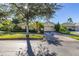 Landscaped front yard with a charming, single-Gathering home at 1287 Glendora Rd, Kissimmee, FL 34759