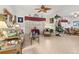 Bright living room featuring a comfy sofa and wicker chairs at 1287 Glendora Rd, Kissimmee, FL 34759