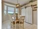 Bright kitchen breakfast nook with window overlooking the garden at 197 Club Villas Ln, Kissimmee, FL 34744