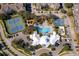 Aerial view of community pool, tennis and basketball courts at 2302 Butterfly Palm Way # 303, Kissimmee, FL 34747