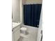 Clean bathroom with single sink vanity, toilet and bathtub at 2303 Walnut Canyon Dr, Kissimmee, FL 34758