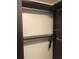 Double-rod reach-in closet with shelving at 2303 Walnut Canyon Dr, Kissimmee, FL 34758