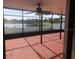 Spacious screened-in patio overlooking a lake at 2303 Walnut Canyon Dr, Kissimmee, FL 34758