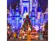 Disney's Christmas parade featuring Mickey and friends in front of Cinderella's Castle at 2603 Isla Bonita Ct, Kissimmee, FL 34747