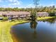 Townhome community with water views and lush landscape at 2618 Bugatti Ct, Kissimmee, FL 34746