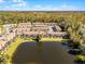 Large townhome community near a pond at 2618 Bugatti Ct, Kissimmee, FL 34746