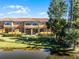 Townhome community with water views and lush landscape at 2618 Bugatti Ct, Kissimmee, FL 34746