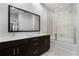 Clean bathroom with double vanity and a shower/tub combo at 2618 Bugatti Ct, Kissimmee, FL 34746
