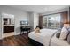 King bedroom with large window and en-suite bathroom at 2618 Bugatti Ct, Kissimmee, FL 34746