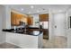 Modern kitchen with stainless steel appliances and breakfast bar at 2618 Bugatti Ct, Kissimmee, FL 34746