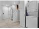 Convenient laundry room with stackable washer and dryer at 2618 Bugatti Ct, Kissimmee, FL 34746