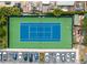 Overhead view of a tennis court with green and blue surface at 2618 Bugatti Ct, Kissimmee, FL 34746