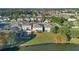 Aerial view of neighborhood, lake, and houses at 2811 Sonata Ct, St Cloud, FL 34772