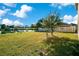 Spacious backyard with lake view and lush grass at 2811 Sonata Ct, Saint Cloud, FL 34772