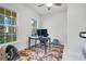 Home office with desk, computer and ample natural light at 2811 Sonata Ct, St Cloud, FL 34772