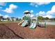 Community playground with slides, climbing structures, and swings at 2811 Sonata Ct, St Cloud, FL 34772