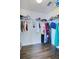 Large walk-in closet with ample hanging and shelving space at 2811 Sonata Ct, St Cloud, FL 34772