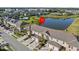 Townhome community near a lake and pool at 355 Highcrest Rd, Davenport, FL 33896