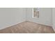 Empty bedroom with carpeted floor and a window at 355 Highcrest Rd, Davenport, FL 33896