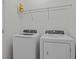 Laundry room with washer and dryer and overhead shelving at 355 Highcrest Rd, Davenport, FL 33896