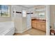 Walk-in shower, tub, and light wood vanity at 4603 Cumbrian Lakes Dr, Kissimmee, FL 34746