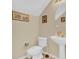 Clean bathroom with toilet, sink, and vanity at 4603 Cumbrian Lakes Dr, Kissimmee, FL 34746