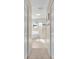 Clean bathroom with shower, tub, and carpet hallway at 4603 Cumbrian Lakes Dr, Kissimmee, FL 34746