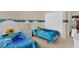 Two twin beds, nightstand, and ample closet space at 4603 Cumbrian Lakes Dr, Kissimmee, FL 34746